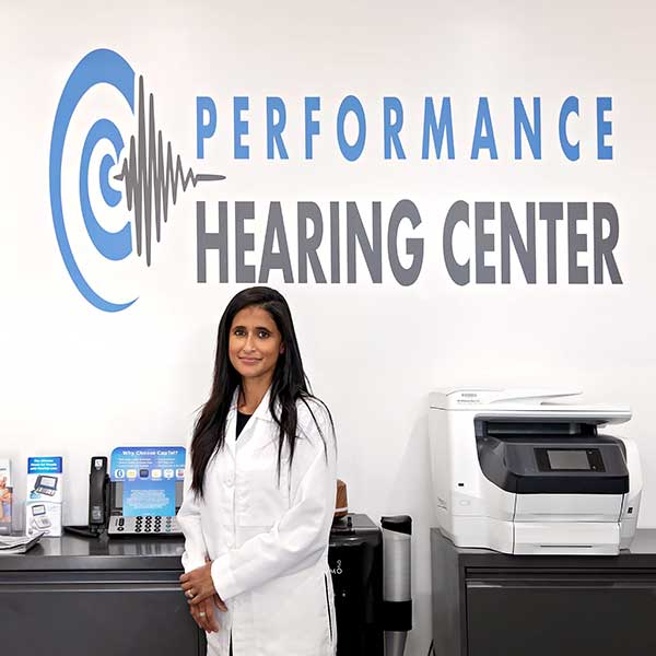 Beverly D'Cunha, Au.D. standing in Performance Hearing Center's office in Winnetka, CA.